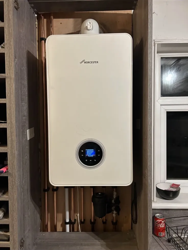 Worcester boiler fitted inside a cupboard