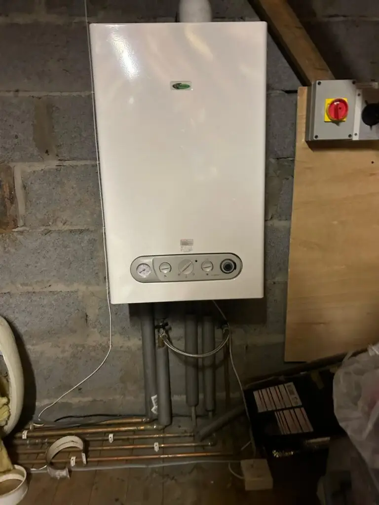 gallery 10 - Buchanan Gas & Heating Ltd Greenstar boiler installation in loft area with copper and insulated pipework against brick wall | Buchanan Gas and Heating