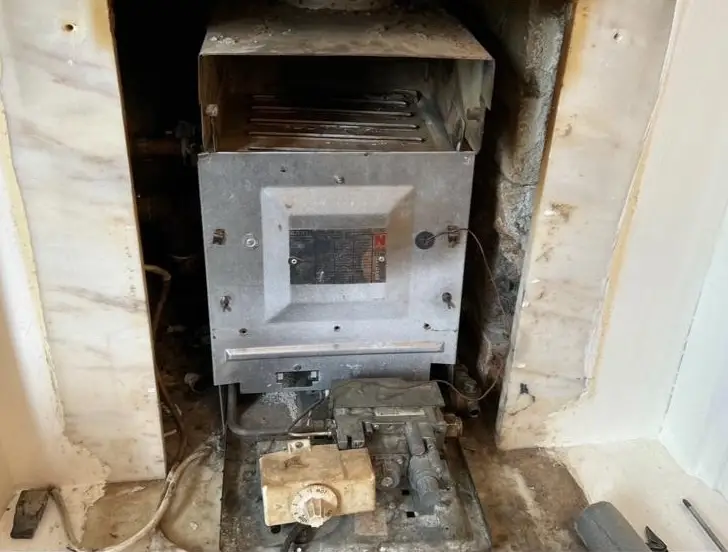 Old boiler removal before replacement installation | Buchanan Gas and Heating
