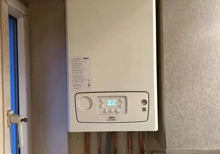 Alpha E-Tec 30NX combi boiler installation with exposed copper pipework by Buchanan Gas and Heating